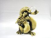 Estátua dragão dourado